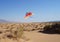 Kite flies in the desert, selective focus