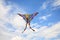 Kite in hand against the blue sky in summer, flying kite launching, fun summer