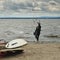 Kite surfer on arrival at the beach of the Steinhuder Meer