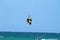 KITE SURFER CATCHING EXTREME AIR