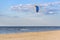 Kite surfer making tricks nea Baltic sea coast line at Riga, Latvia