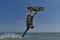 Kite surfer rjumps with kiteboard