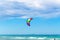 Kite surfer under a cloudy sky