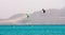 Kite surfers, blue sea and mount background