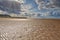 Kite surfers on broad sand rippled beach at Old Hunstanton, Norfolk, England