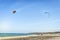 Kite surfers on calm italian beach, Puglia