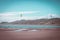 Kite surfers on raglan beach in New Zealand