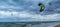 Kite surfers under the stormy sky