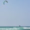 Kiteboarder jumping in waves Boa Vista Cape Verde