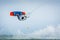 Kiteboarder kitesurfer athlete jumping, kitesurfing kiteboarding jump