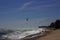 Kiteboarding, itesurfing at sunset in Mui Ne beach, Vietnam Phan Thiet