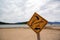 Kiteboarding, wooden kitesurfing sign on beach