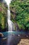 Kitekite Falls in New Zealand. Beautiful view of amazing waterfalls in the middle of the nature.