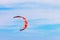 Kitesurf in the blue sky with clouds, sports background