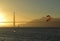 Kitesurfer in front of Golden Gate Bridge, San Francisco sunset