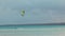Kitesurfer Kitesurfing In Blue Lagoon Reef & Sea In Cook Islands South Pacific Ocean