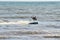 Kitesurfer rides waves on Lake Ontario on a cold November day.