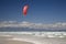 Kitesurfer riding the waves at Strandfontein