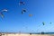 Kitesurfers beach kites