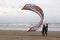 Kitesurfers launching kite