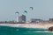 Kitesurfers in the water at City Beach, one of the most popular beaches of Perth on the Indian Ocean