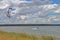 Kitesurfing in the estuary under a picturesque sky