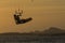 Kitesurfing girl silhouette jumping at golden hour sunset woman kiteboarding jump