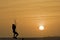 Kitesurfing girl silhouette jumping at golden hour sunset woman kiteboarding jump