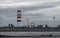 Kitesurfing Lighthouse and people walking around on the coast of Neusiedl lake, Asutria