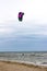 Kitesurfing on the waves of the sea