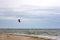 Kitesurfing on the waves of the sea