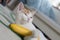 Kitten ginger white holding banana funny close-up playing