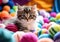 Kitten in the middle of balls of wool. Winter time. AI generated