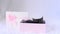 A kitten for present a holiday. Young gray cat is lies in a pink gift box on a white background. A cute little pet