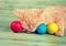 Kitten sleeping on colored easter eggs