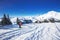 KITZBUEHEL, AUSTRIA, February 17, 2016 - Skiers on ski lift enjoying the view to foggy Alps in Austria and beautiful snowy country