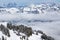 KITZBUEHEL, AUSTRIA - February 18, 2016 - Skier skiing and enjoying the view to Alpine mountains in Austria