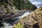 Kivach waterfall. Powerful stream of water in a beautiful natural park