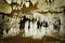 Kiwengwa Caves on Zanzibar island in Tanzania, worship locals ancestors, gifts to the holy stones, stalagmites and stalactites