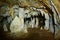 Kiwengwa Caves on Zanzibar island in Tanzania, worship locals ancestors, gifts to the holy stones, stalagmites and stalactites