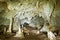 Kiwengwa Caves on Zanzibar island in Tanzania, worship locals ancestors, gifts to the holy stones, stalagmites and stalactites