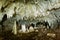 Kiwengwa Caves on Zanzibar island in Tanzania, worship locals ancestors, gifts to the holy stones, stalagmites and stalactites