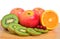Kiwi, apples, orange and cranberry