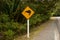 Kiwi crossing road sign