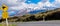 Kiwi Crossing road sign and volcano Ruapehu, NZ