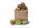 Kiwi friut in sack on floor wood