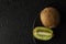 Kiwi fruit isolated on black background with water drops, fresh kiwi fruit. Summer vitamine fruit. Healthy food or dessert. Diet,