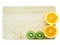 Kiwi fruit and orange on wooden block, isolate on white