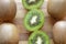 Kiwi fruit wholes and slices arranged