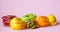 Kiwi, orange, lemon and red, green, yellow apple peels